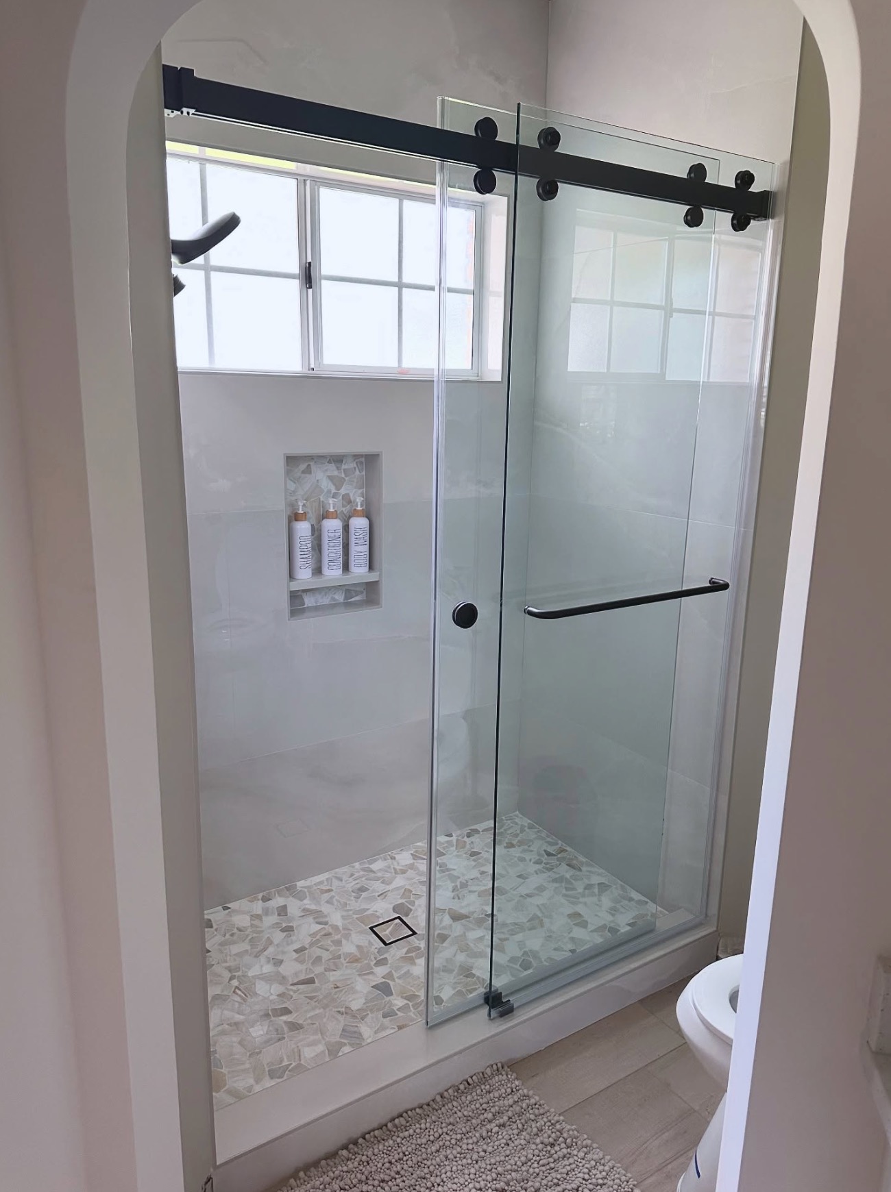 Custom walk-in tile shower built by Limitless Tile and Stone in Middleburg, Florida